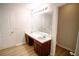 Double vanity bathroom with large mirror at 4126 Mcbride Dr, Powder Springs, GA 30127