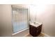 Small bathroom with single vanity and window at 4126 Mcbride Dr, Powder Springs, GA 30127