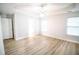 Bright bedroom with hardwood floors and access to bathroom at 4126 Mcbride Dr, Powder Springs, GA 30127