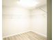 Large walk-in closet with wire shelving for storage at 4126 Mcbride Dr, Powder Springs, GA 30127