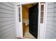 Inviting entryway with an open door revealing a spacious interior at 4126 Mcbride Dr, Powder Springs, GA 30127