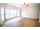 Relaxing living room featuring hardwood floors and a ceiling fan at 4126 Mcbride Dr, Powder Springs, GA 30127