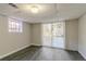 Finished basement room featuring a sliding glass door at 8652 Embrey Dr, Jonesboro, GA 30236