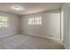 Spacious bedroom with new carpet and neutral wall paint at 8652 Embrey Dr, Jonesboro, GA 30236