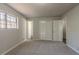 Large bedroom with ample closet space and neutral decor at 8652 Embrey Dr, Jonesboro, GA 30236