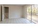Bright dining room with tile floors and sliding glass doors leading to deck at 8652 Embrey Dr, Jonesboro, GA 30236