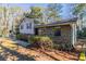 Charming ranch home with stone exterior and landscaping at 8652 Embrey Dr, Jonesboro, GA 30236