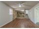 Living room with stone fireplace and hardwood floors at 8652 Embrey Dr, Jonesboro, GA 30236