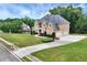Large house with a three-car garage and a large yard at 1426 Greenridge Trl, Lithonia, GA 30058