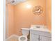 Small basement bathroom with shower, toilet and sink at 1426 Greenridge Trl, Lithonia, GA 30058