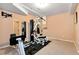 Finished basement gym with exercise equipment and mirror at 1426 Greenridge Trl, Lithonia, GA 30058