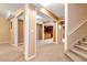 Finished basement with neutral carpeting and a wet bar at 1426 Greenridge Trl, Lithonia, GA 30058