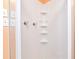 Basement shower stall with white tile and glass door at 1426 Greenridge Trl, Lithonia, GA 30058