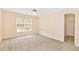 Bright bedroom featuring a large window and walk-in closet at 1426 Greenridge Trl, Lithonia, GA 30058