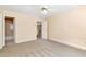 Spacious bedroom with carpet and ceiling fan at 1426 Greenridge Trl, Lithonia, GA 30058
