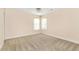 Well-lit bedroom with two windows and ceiling fan at 1426 Greenridge Trl, Lithonia, GA 30058