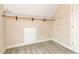 Spacious closet with built in shelving and hanging rods at 1426 Greenridge Trl, Lithonia, GA 30058