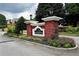 Attractive brick entrance to Greenridge community with landscaping at 1426 Greenridge Trl, Lithonia, GA 30058