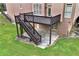 Spacious deck with stairs leading to the backyard at 1426 Greenridge Trl, Lithonia, GA 30058