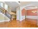 Formal dining room with hardwood floors and archway at 1426 Greenridge Trl, Lithonia, GA 30058