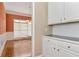 Bright dining room with hardwood floors and access to kitchen at 1426 Greenridge Trl, Lithonia, GA 30058