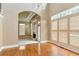 Open dining room featuring hardwood floors and views to living room at 1426 Greenridge Trl, Lithonia, GA 30058