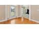Hardwood floor entryway with glass door and office view at 1426 Greenridge Trl, Lithonia, GA 30058