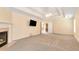 Main bedroom with fireplace, carpet and access to loft at 1426 Greenridge Trl, Lithonia, GA 30058