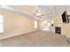 Main bedroom with fireplace, ceiling fan and carpet at 1426 Greenridge Trl, Lithonia, GA 30058