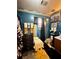Full bathroom with teal walls, shower/tub combo, and updated flooring at 985 Farrington Se Pl, Atlanta, GA 30315