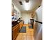 Efficient kitchen with wood cabinets and stainless steel appliances at 985 Farrington Se Pl, Atlanta, GA 30315