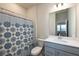 Small bathroom with shower/tub combo and vanity at 1076 Allspice Way, Lawrenceville, GA 30045