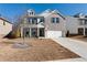 Two-story brick home with a large front yard and attached garage at 1076 Allspice Way, Lawrenceville, GA 30045