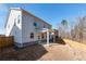 Two story home exterior, covered patio, fenced backyard at 1076 Allspice Way, Lawrenceville, GA 30045