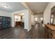 Open foyer with dark hardwood floors and views to living areas at 1076 Allspice Way, Lawrenceville, GA 30045
