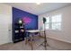 Bright home office features a workspace, shelving, and plenty of natural light at 1076 Allspice Way, Lawrenceville, GA 30045