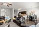 Inviting living room flowing into a dining area and kitchen with stainless steel appliances at 7174 Fringe Flower Dr # 21, Austell, GA 30168