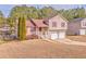 House with brown roof, deck, and backyard at 108 Ivy Trace Ln, Dallas, GA 30157