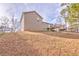 House with deck and sloped backyard at 108 Ivy Trace Ln, Dallas, GA 30157