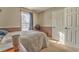 Bright bedroom with double bed and ample closet space at 108 Ivy Trace Ln, Dallas, GA 30157