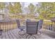 Deck with table and chairs overlooking wooded area at 108 Ivy Trace Ln, Dallas, GA 30157