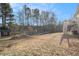 A large backyard features an above-ground pool with deck, a shed, and a grassy area at 118 Gilberts Way, Temple, GA 30179