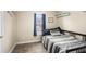 Bedroom featuring a window with natural light, and stylish flooring at 118 Gilberts Way, Temple, GA 30179