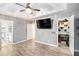 This primary bedroom has an en suite bathroom and walk-in closet at 118 Gilberts Way, Temple, GA 30179