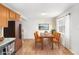 A dining area featuring a table setting adjacent to the kitchen space at 118 Gilberts Way, Temple, GA 30179