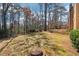 Lush backyard with mature trees, perfect for relaxing or entertaining at 1525 Terrell Mill Se Pl # A, Marietta, GA 30067
