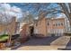 Exterior of a home with tidy landscaping and a prominent staircase, and a side yard at 1525 Terrell Mill Se Pl # A, Marietta, GA 30067
