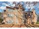 View of a three story exterior with balconies and many windows providing ample natural light at 1525 Terrell Mill Se Pl # A, Marietta, GA 30067