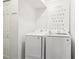 Convenient laundry room featuring modern washer and dryer units at 1525 Terrell Mill Se Pl # A, Marietta, GA 30067