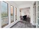 Open-concept living room featuring tile floors and plenty of natural light at 1525 Terrell Mill Se Pl # A, Marietta, GA 30067